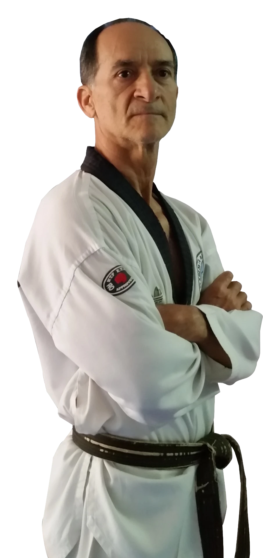 Grão-mestre Abreu de dobok branco e faixa preta na Academia Abreu em Taguatinga-DF